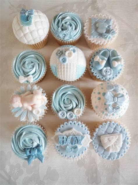 Snug the green tissue paper in between the cupcakes. boy baby shower cupcakes | Elephant baby shower decorations, Baby shower cupcake cake, Baby ...