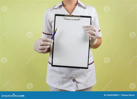 Doctor With Blank Clipboard On Isolated Py Space Stock