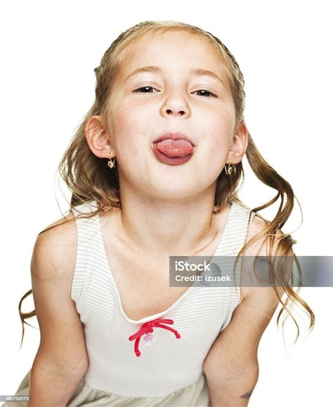 Little Girl Sticking Out Tongue Stock Photo Download Image Now