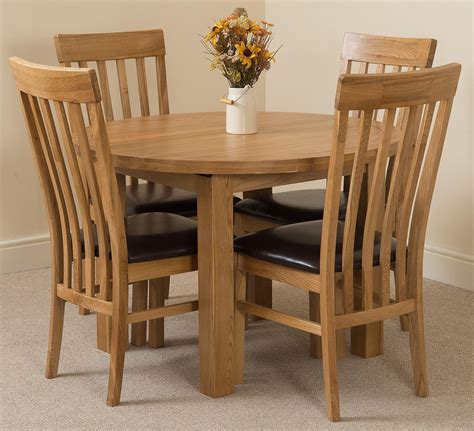 This chair's traditional form perfectly accents the understated linen fabric and the wood's weathered finish. Edmonton Solid Oak Extending Oval Dining Table With 4 ...