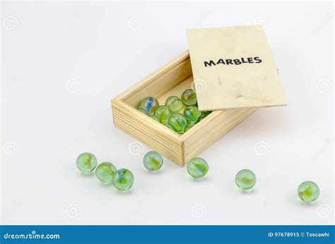 Wood Box Of Green Glass Marbles On White Background Stock Image Image