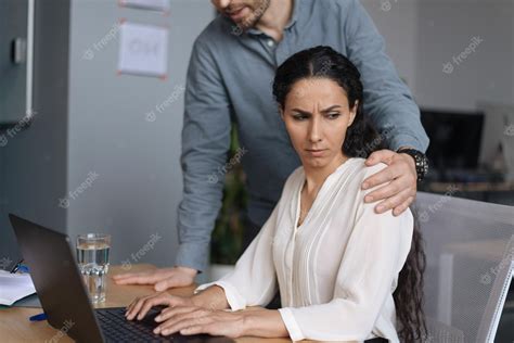 Premium Photo Workplace Harassment Male Boss Touching His Young Female Assistant While She Is