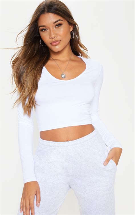 White Long Sleeve V Neck Crop Top Prettylittlething Uae