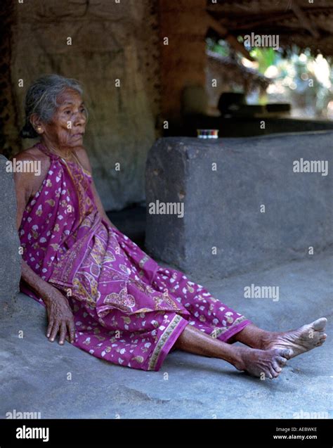 An Old Tribal Woman Sitting Infront Of Her Hut Kerala India Stock Photo Alamy