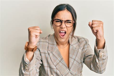 Young Brunette Woman Wearing Business Jacket And Glasses Angry And Mad