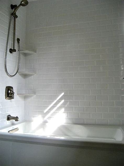 The first and most important step for tiling bathroom walls insists tiling around a tub shower overview. 6 Enviable Bathtub Surround Ideas | Hunker