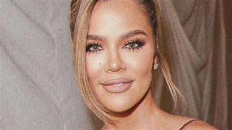 Khloe Kardashian Shows Off Her Abs And Thin Legs In A Tiny Hot Pink String Bikini In A New Video