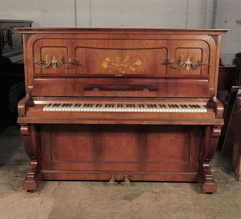 Ronisch Upright Piano For Sale With A Rosewood Case And Ornate Brass