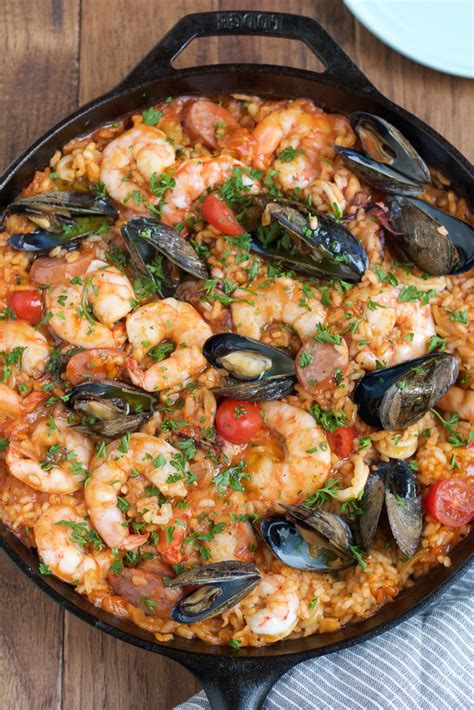 This recipe allows creativity in what it's served with and is a dish that will keep guests coming back for more! Authentic, Spicy Seafood Paella Recipe with Saffron - Hip ...