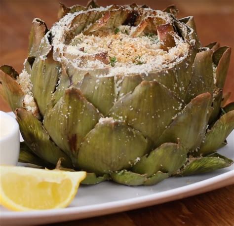 Aunque nunca me quedan igual que a ella, por mucho que siga sus instrucciones, cocinarlas desde la distancia es una forma de mantenerme conectada a mis raíces y. Receta de alcachofas gourmet con queso parmesano | Recetas ...