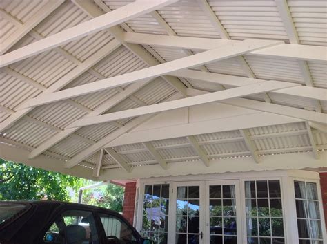The dutch hip roof is basically a hip roof with a small gable at either end. Dutch Gable Carport - All Type Roofing
