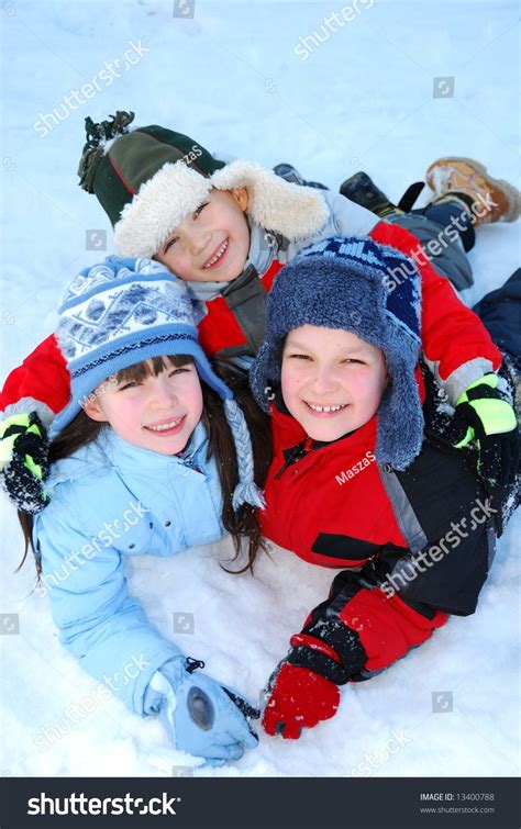 Children Playing In Snow Stock Photo 13400788 Shutterstock