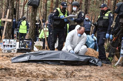 Mass Graves Unearthed In Ukraines Izyum After Russian Retreat