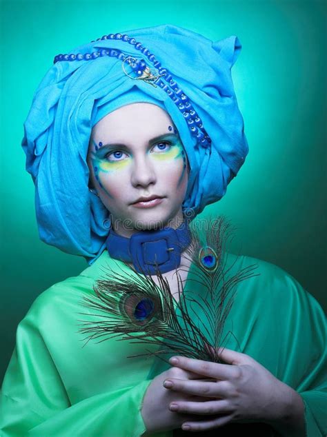 Young Woman With Peacock Feathers Stock Image Image Of Blue Looking