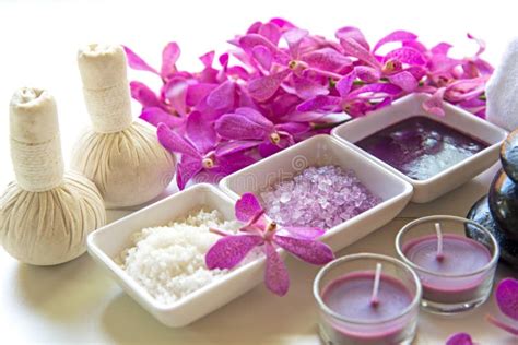 Thai Spa Treatments Aroma Therapy Salt And Sugar Scrub And Rock Massage With Orchid Flower On