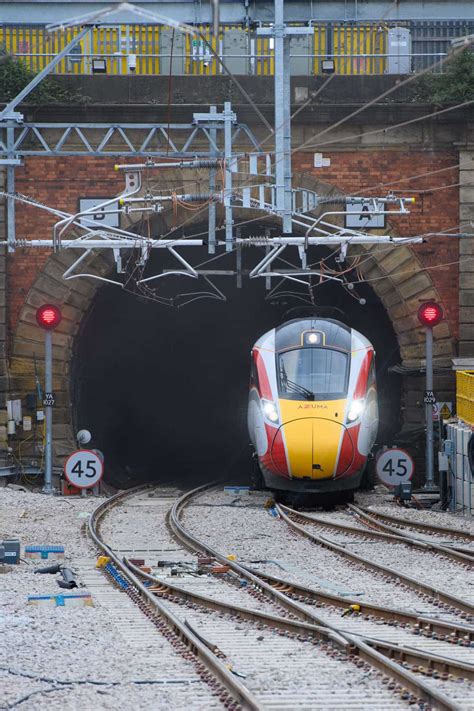 First Lner Train Passes Through Third Tunnel At London Kings Cross For