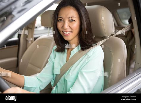 Happy Woman Driving And Smiling Stock Photo Alamy