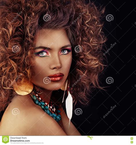Beautiful Model Woman Curly Hair Makeup And Dark Bronze Skin Stock