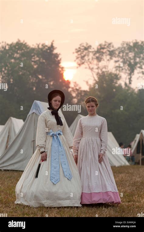 Young Women In Period Costume At A Civil War Reenactment Stock Photo