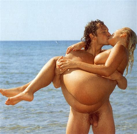 Couple Holding Erection Nude Beach