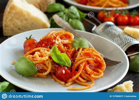 This versatile tomato sauce may also be spread on pizza, or served with hearty sandwiches such as meatball subs and calzones. Spaghetti Pasta With Tomato Sauce Stock Image - Image of nutrition, parmesan: 127980027