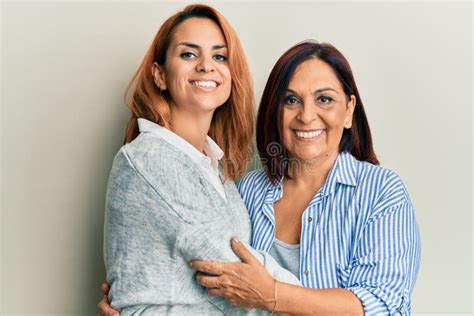 Latin Mother And Daughter Wearing Casual Clothes Looking Positive And Happy Standing And Smiling