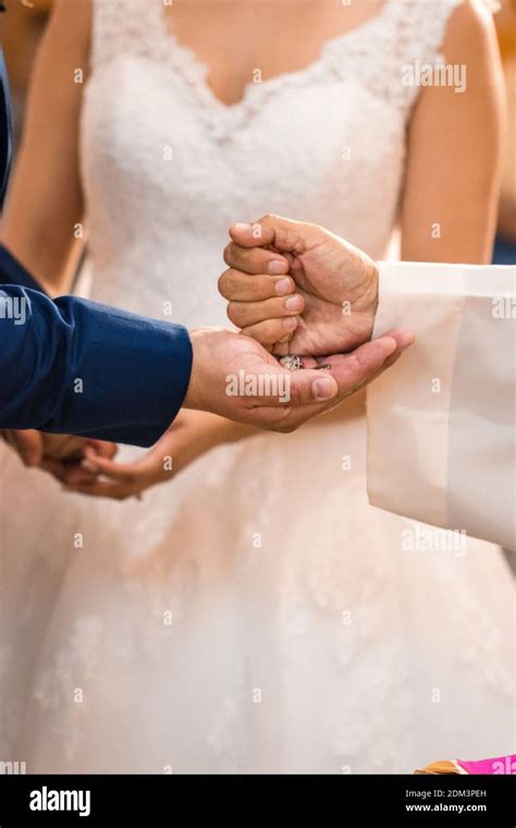 Priest Blessing Couple During Wedding Ceremony Stock Photo Alamy