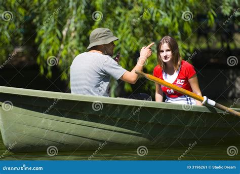 Couple In Rowboat Stock Image Image Of Rowboat Active 3196261
