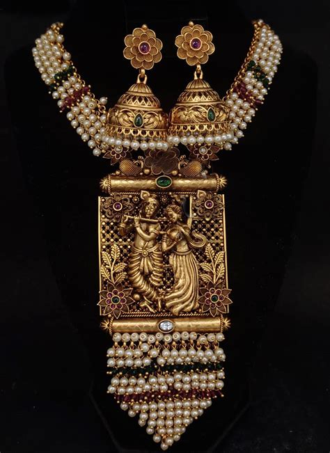 Radha Krishna Gold Tone Latest Temple Necklace Set Collection Catalog
