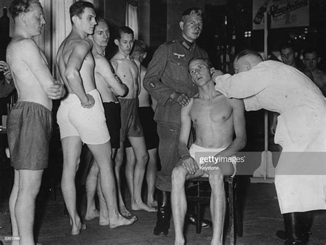 Young Conscripted Recruits Undergoing A Medical Examination In Photo