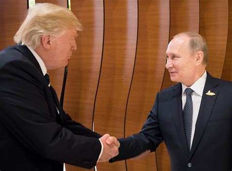 First Images Of Trump And Putin Together