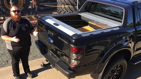 Lock roller shutter lid locks to the truck bed for added security. SHOCKING Ford Ranger Wildtrak Roller Shutter Security ...