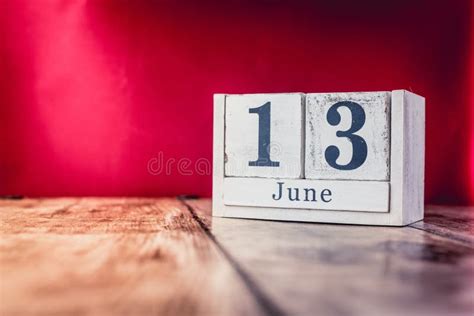 June 13th Image Of June 13 Calendar On Yellow Sandy Background With