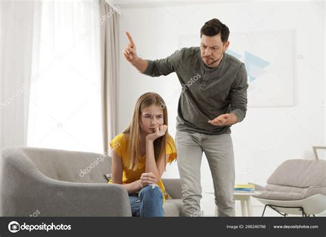 Father Scolding His Teenager Daughter At Home Stock Photo By ©newafrica