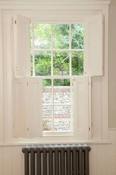 Solid panel shutters are very good at insulating and give a traditional cosy look. Replacing windows on period properties | Indoor shutters ...