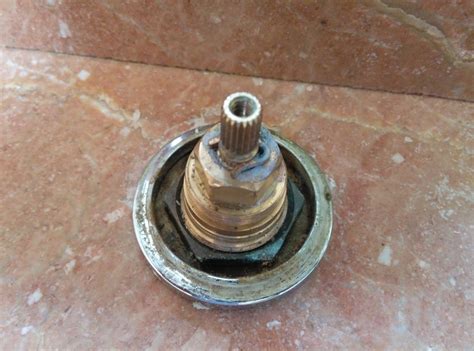 I'm guessing when you say swing arm you are referring to the handles. bathroom - faucet (grohe arden?) leak. how do i remove the ...