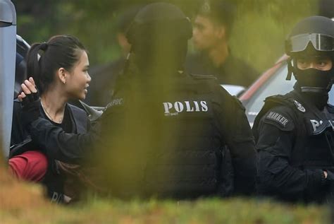 kim murder suspects appear in malaysian court