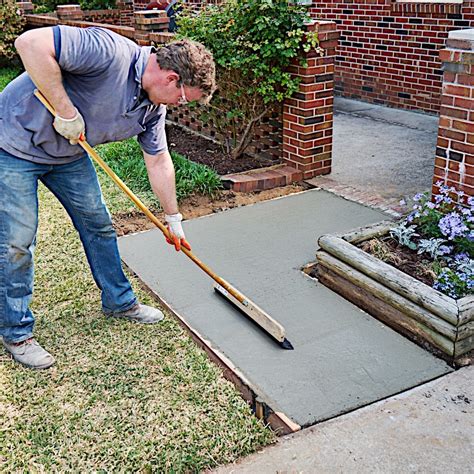 How To Pour And Finish A Concrete Sidewalk Diy Concrete Slab Diy