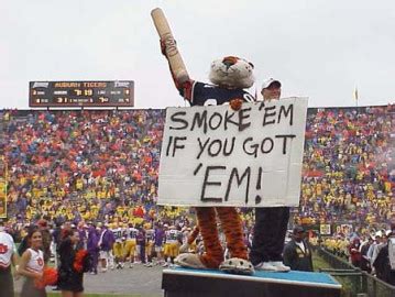 That Photo Of Aubie Smoking A Giant Cigar At The LSU Game Like