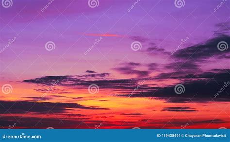 Dark Purple Sunset Sky And Ray Sunlight Back On Silhouette Orange Cloud