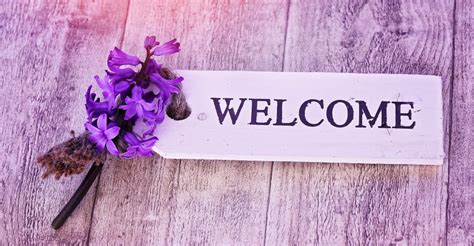 Welcome With Purple Flower Signage Free Image Peakpx
