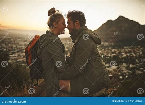 Find Your Adventurous Match An Affectionate Couple On A Mountain Top
