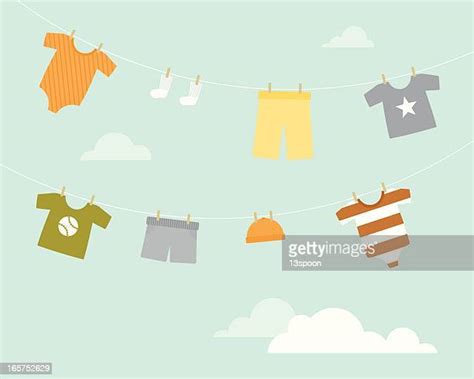 Baby Clothes On Washing Line Photos And Premium High Res Pictures