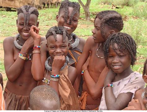 A Group Of Happy And Smiling Ethnic Himba Girls From Opuwa In Kaokoland