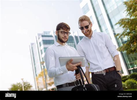 Business People Talking Outdoors Stock Photo Alamy