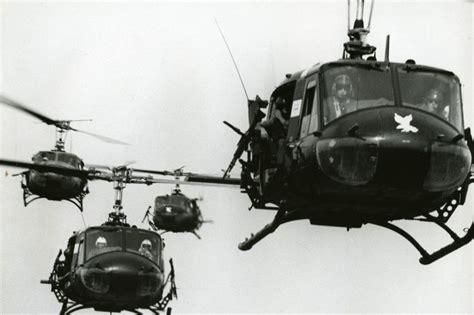 Bell Uh 1 Huey Helicopter In Formation Flight In Vietnam Helicopters