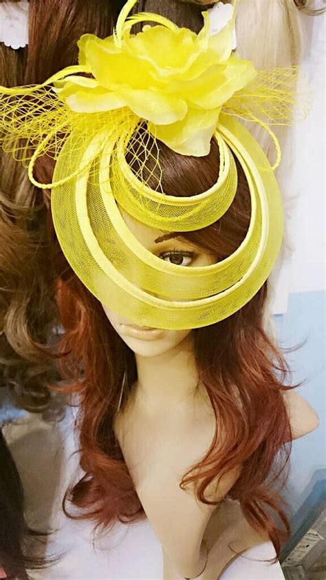 sunshine yellow fascinator hat with tulle rings silk flower for derby church party wedding
