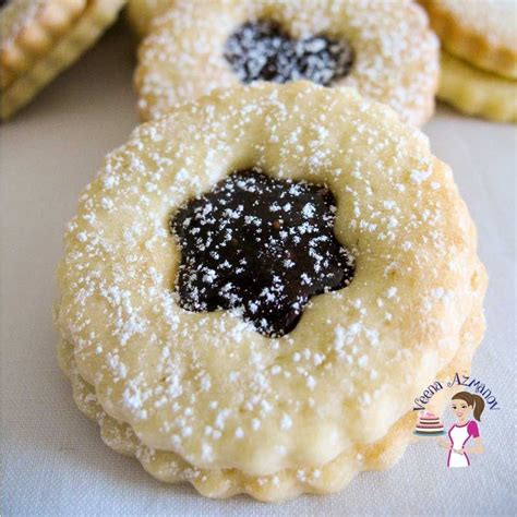 Austrian pecan cookies is one of the most yummy treats i have come across. These Austrian almond Linzer cookies are not just beautiful but delicious too. Made with a melt ...