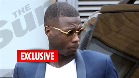 nicolas pepe clutches arsenal shopping bag after completing medical ahead of stunning club