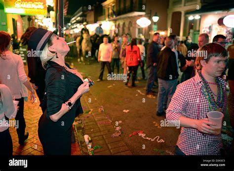 Woman Flashing Bourbon Street Mardi Gras New Orleans Stock Photo